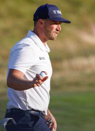 Wyndham Clark reacts after making a birdie on the 14th hole during the third round of the 126th U.S. Open Golf Championship at Shinnecock Hills Golf Club in Southampton, NY, on Saturday, June 20, 2026.  NYC20260620821 JOHNxANGELILLO