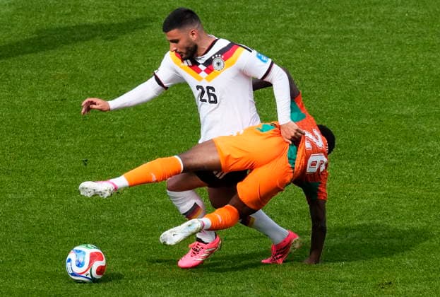 June 20, 2026, Toronto, On, CANADA: Germany s Deniz Undav (top) battles for the ball with Ivory Coast s Christ Inao Oulai during the second half of a World Cup Group E soccer match, in Toronto, on Saturday, June 20, 2026. Canada News - June 20, 2026  - ZUMAc35_ 20260620_zaf_c35_169 Copyright: xChrisxYoungx