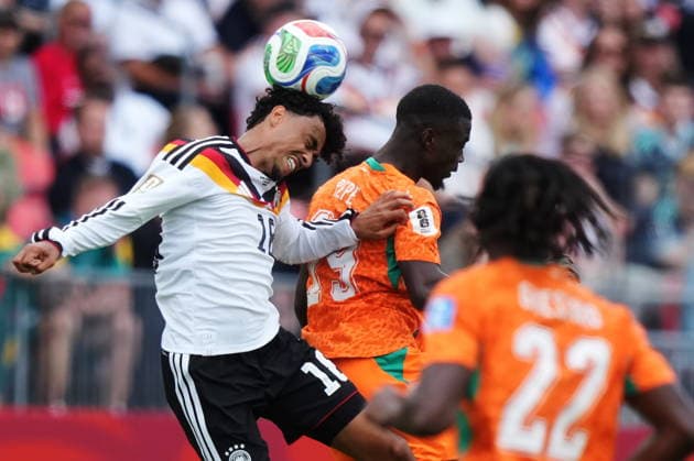 June 20, 2026, Toronto, On, CANADA: Germany s Nathaniel Brown (left) heads the ball over Ivory Coast s Nicolas Pepe (19) during the second half of a World Cup Group E soccer match, in Toronto, on Saturday, June 20, 2026. Canada News - June 20, 2026  - ZUMAc35_ 20260620_zaf_c35_172 Copyright: xNathanxDenettex