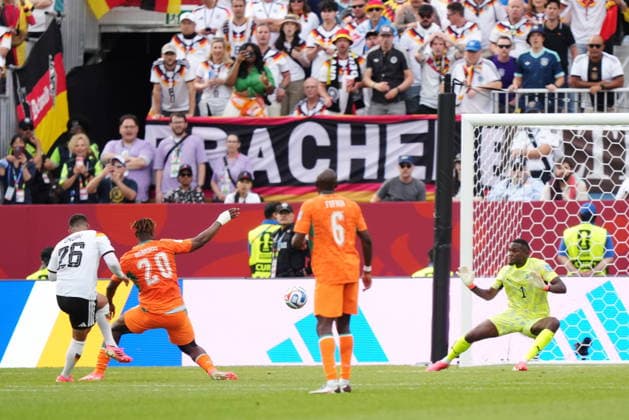 June 20, 2026, Toronto, On, CANADA: Germany s Deniz Undav (26) scores on Ivory Coast goalkeeper Yahia Fofana (1) as Emmanuel Agbadou (20) defends during the second half of a World Cup Group E soccer match, in Toronto, on Saturday, June 20, 2026. Canada News - June 20, 2026  - ZUMAc35_ 20260620_zaf_c35_176 Copyright: xNathanxDenettex