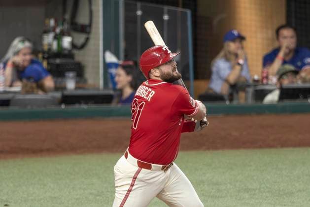 June 20, 2026, Arlington, Texas, USA: Texas Rangers first baseman JAKE BURGER (21) hits a two run homerun during a MLB, Baseball Herren, USA game between the San Diego Padres and Texas Rangers at Globe Life Field. San Diego wins in extra innings 6-4. Arlington USA - ZUMAf180 20260620_zsp_f180_010 Copyright: xMarkxFannx