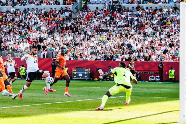 TORONTO, ON - JUNE 20: Forward Deniz Undav (26) of Germany attacks as goalkeeper Yahia Fofana (1) of Cote d Ivoire looks on during the second half of the FIFA World Cup, WM, Weltmeisterschaft, Fussball 2026 Group E match between Germany and Cote d Ivoire on June 20, 2026, at Toronto Stadium in Toronto, ON. (Photo by Mathew Tsang Icon Sportswire) SOCCER: JUN 20 FIFA World Cup 26 Group E - Germany vs Cote d Ivoire EDITORIAL USE ONLY Icon260620016