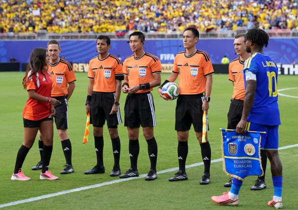 (260621) -- KANSAS CITY, June 21, 2026 -- Referees (rear) line up before the group E match between Ecuador and Curacao at the FIFA World Cup, WM, Weltmeisterschaft, Fussball 2026 at Kansas City Stadium in Kansas City, the United States, June 20, 2026. ) (SP)U.S.-KANSAS CITY-FOOTBALL-FIFA WORLD CUP-GROUP E-ECU VS CUW DuxYu 