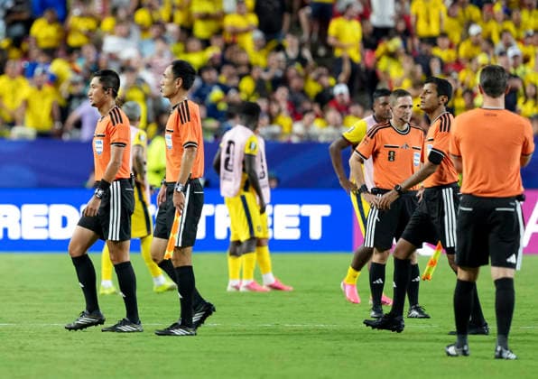 (260621) -- KANSAS CITY, June 21, 2026 -- Referees react after the group E match between Ecuador and Curacao at the FIFA World Cup, WM, Weltmeisterschaft, Fussball 2026 at Kansas City Stadium in Kansas City, the United States, June 20, 2026. ) (SP)U.S.-KANSAS CITY-FOOTBALL-FIFA WORLD CUP-GROUP E-ECU VS CUW DuxYu 