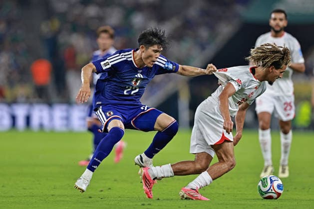 June 20, 2026, Monterrey, Mexico: Hannibal Mejbri of Tunisia battles for possession ball with Takehiro Tomiyasu of Japan during the match between Tunisia and Japan for the 2st round of the group F of the FIFA World Cup, WM, Weltmeisterschaft, Fussball 2026 at Monterrey Stadium on June 20, 2026 in Monterrey, Mexico. Photo: DiaEsportivo Monterrey Mexico - ZUMAh208 20260620_zsp_h208_030 Copyright: xHeulerxAndreyx
