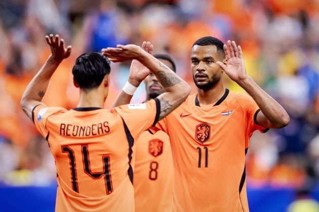 HOUSTON - Tijjani Reijnders of the Netherlands and Cody Gakpo of the Netherlands celebrate the 4-0 during the 2026 FIFA World Cup, WM, Weltmeisterschaft, Fussball Group F match between the Netherlands and Sweden at Houston Stadium on June 20, 2026, in Houston, United States. ROBIN VAN LONKHUIJSEN ANP FIFA World Cup 2026 group stage 2026 xVIxANPxSportx xxANPxIVx 561562277 originalFilename: 561562277.jpg
