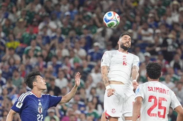 Tunisia v Japan - FIFA World Cup, WM, Weltmeisterschaft, Fussball 2026 - Group F MONTERREY, MEXICO - JUNE 20: Dylan Bronn (6) of Tunisia in action against Takehiro Tomiyasu (22) of Japan during the 2026 FIFA World Cup First Stage Group F match between Tunisia and Japan at Estadio BBVA (Monterrey Stadium) in Monterrey, Mexico on June 20, 2026. Juancho Torres Anadolu Nuevo Leon Mexico. Editorial use only. Please get in touch for any other usage.  Copyright: x2026xAnadoluxJuanchoxTorresx