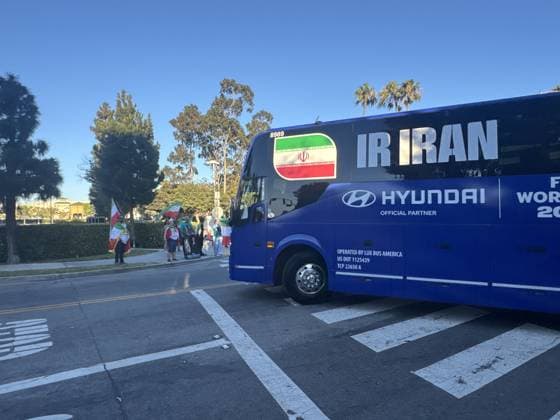 Protesters gather outside hotel hosting Iran national team, Nationalteam ahead of Belgium match LOS ANGELES, UNITED STATES - JUNE 20: Protesters gather outside the hotel hosting Iran’s national football team ahead of its 2026 FIFA World Cup, WM, Weltmeisterschaft, Fussball Group G match against Belgium, waving Iran’s former lion-and-sun flag and U.S. flags, in Los Angeles, United States, on June 20, 2026. Bozhan Memis Anadolu Los Angeles United States. Editorial use only. Please get in touch for any other usage.  Copyright: x2026xAnadoluxBozhanxMemisx