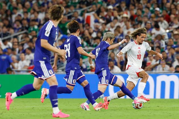 FIFA World Cup, WM, Weltmeisterschaft, Fussball 2026 - Group F - Tunisia vs. Japan Hannibal Mejbri (R) of Tunisia in action against Junya Ito (2-R) of Japan during the 2026 FIFA World Cup Group F soccer match between Tunisia and Japan at the at BBVA stadium in Monterrey, Mexico, 20 June 2026. Monterrey Mexico  Copyright: xSashenkaxGutiérrezx