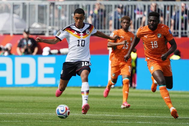 Fussball , Weltmeisterschaft 2026, FIFA WM 2026, Fussball World Cup , Canada USA, Mexico-2026, , Deutschland vs ElfenbeinKüste Germany vs Ivory Coast, Gruppenphase, Gruppen E , 20 .06.2026, Toronto Stadium Kanada, Jamal Musiala Deutschland Aktion Einzelbild, Foto Chai von der Laage FIFA regulations prohibit any use of photographs as image sequences and or quasi-video. EDITORIAL USE ONLY, *** Soccer, 2026 World Cup, FIFA World Cup 2026, Soccer World Cup, Canada, USA, Mexico 2026, , Germany vs. Ivory Coast, Group Stage, Group E, June 20, 2026, Toronto Stadium, Canada, Jamal Musiala (Germany) in action (still image), Photo by Chai von der Laage. FIFA regulations prohibit any use of photographs as image sequences and or quasi-video. EDITORIAL USE ONLY,,detected_source_language