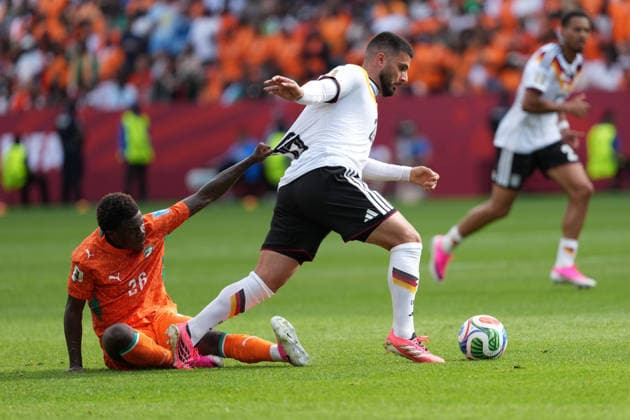 Ivory Coast vs Germany FIFA World Cup, WM, Weltmeisterschaft, Fussball Group G Match Deniz Undav 26 of Germany and Christ Inao Oulai 26 of Ivory Coast battle for the ball during the 2026 FIFA World Cup Group E match between Germany and Ivory Coast at Toronto Stadium. on June 20, 2026 in Toronto, Canada. (Photo by Leonardo Ramirez Eyepix Group) Copyright: xLeonardoxRamirezx xEyepixxGroupx LR20062026-09974