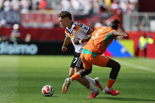 Toronto, Canada - 20 June: Florian Wirtz 17 of Germany and Wilfried Singo 5 of Cote d Ivoire battle for the ball during the FIFA World Cup, WM, Weltmeisterschaft, Fussball 2026 match between Germany vs Cote d Ivoire at Toronto Stadium on 20 June 2026. Copyright: xOPAxImagesxMohammadxKaramalix