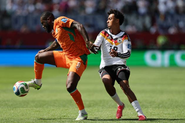 Toronto, Canada - 20 June: Franck Kessie 8 of Cote d Ivoire and Nathaniel Brown 18 of Germany in action during the FIFA World Cup, WM, Weltmeisterschaft, Fussball 2026 match between Germany vs Cote d Ivoire at Toronto Stadium on 20 June 2026. Copyright: xOPAxImagesxMohammadxKaramalix