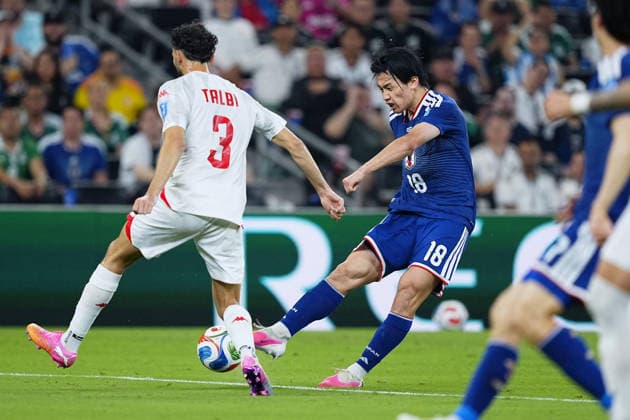 Football: 2026 World Cup Japan s Ayase Ueda (back, R) scores the team s second goal in the first half of a World Cup Group F football match against Tunisia at Monterrey Stadium in Guadalupe, Mexico, on June 20, 2026.  A14AA0005619609P