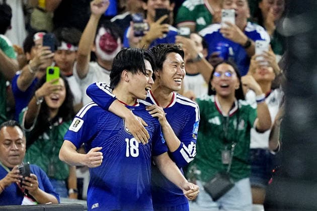 Football: 2026 World Cup Japan s Ayase Ueda (18) celebrates with Daichi Kamada after scoring the team s second goal in the first half of a World Cup Group F football match against Tunisia at Monterrey Stadium in Guadalupe, Mexico, on June 20, 2026.  A14AA0005619618P