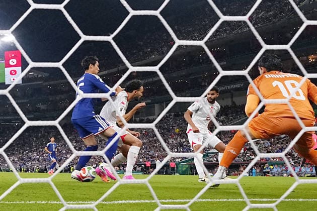 Football: 2026 World Cup Japan s Daichi Kamada (far L) scores the opening goal in the first half of a World Cup Group F football match against Tunisia at Monterrey Stadium in Guadalupe, Mexico, on June 20, 2026.  A14AA0005619631P