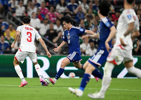 (260621) -- MONTERREY, June 21, 2026 -- Ueda Ayase (2nd L) of Japan shoots to score during the group F match between Japan and Tunisia at the 2026 FIFA World Cup, WM, Weltmeisterschaft, Fussball at Estadio Monterrey in Monterrey, Mexico, on June 20, 2026. ) (SP)MEXICO-MONTERREY-FOOTBALL-FIFA WORLD CUP-GROUP F-JPN VS TUN WuxWei 