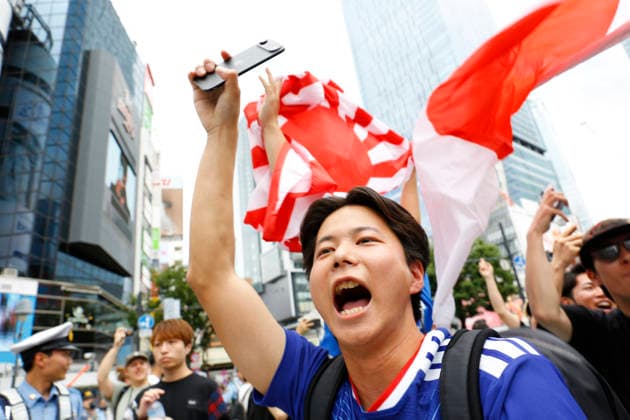 June 21, 2026, Tokyo, Japan: Japanese soccer fans celebrate Japan s victory over Tunisia at the famous Shibuya Scramble Crossing in Tokyo. The Tokyo Metropolitan Police protected the world-famous pedestrian crossing after Japan defeated Tunisia (4Ã¢â‚¬0) in a FIFA World Cup, WM, Weltmeisterschaft, Fussball 2026 Group F match. Tokyo Japan - ZUMAm191 20260621_aap_m191_004 Copyright: xRodrigoxReyesxMarinx
