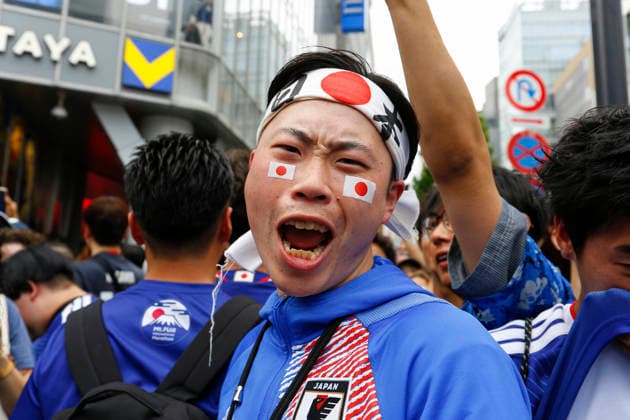 June 21, 2026, Tokyo, Japan: Japanese soccer fans celebrate Japan s victory over Tunisia at the famous Shibuya Scramble Crossing in Tokyo. The Tokyo Metropolitan Police protected the world-famous pedestrian crossing after Japan defeated Tunisia (4Ã¢â‚¬0) in a FIFA World Cup, WM, Weltmeisterschaft, Fussball 2026 Group F match. Japan Celebrates 4Ã¢â‚¬0 World Cup Victory At Shibuya Crossing  - ZUMAm191 20260621_aap_m191_008 Copyright: xRodrigoxReyesxMarinx