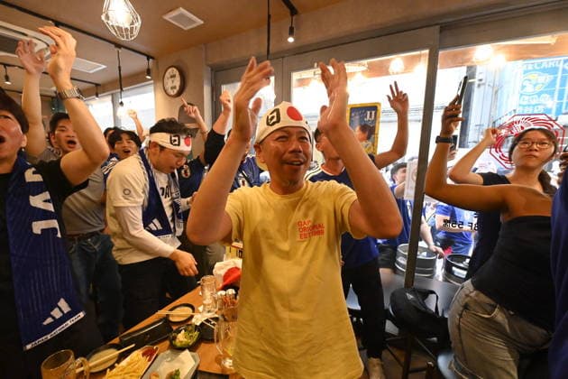 Fans gather at Shibuya to watch Japan and Tunisia World Cup match TOKYO, JAPAN - JUNE 21: Football fans gather in bars, restaurants and public areas of Tokyo’s Shibuya district to watch the FIFA World Cup, WM, Weltmeisterschaft, Fussball 2026 Group F match between Japan and Tunisia being played in Monterrey, Mexico on June 21, 2026. The match is considered crucial for both teams’ hopes of advancing to the knockout stage of the tournament. David Mareuil Anadolu Tokyo Japan. Editorial use only. Please get in touch for any other usage.  Copyright: x2026xAnadoluxDavidxMareuilx