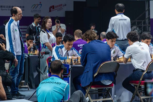 June 21, 2026, Hong Kong, Hong Kong, China: NODIRBEK ABDUSATTOROV (UZB) clashes with MAGNUS CARLSEN (NOR) during the Blitz quarterfinals of the 2026 FIDE World Team Rapid and Blitz Chess Championship in Hong Kong. Hong Kong China - ZUMAm298 0859646208st Copyright: xJamesxModestox