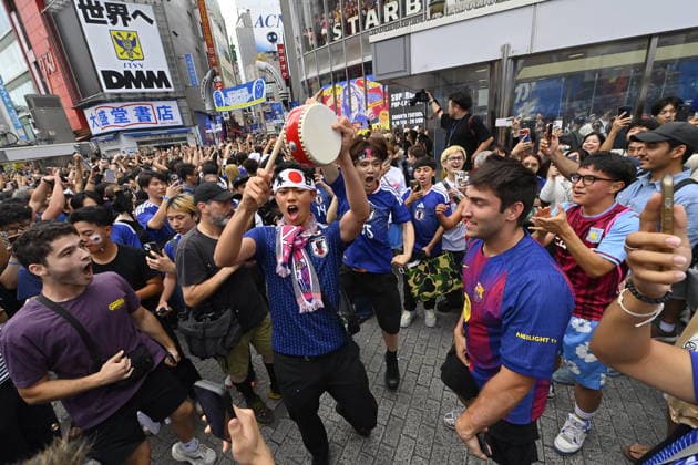 Japan-Tunisia World Cup match draws fans to Tokyo s Shibuya District TOKYO, JAPAN - JUNE 21: Football fans celebrate the victory of Japan team over Tunisia in public areas of Tokyo s Shibuya district, Japan on June 21, 2026, after the FIFA World Cup, WM, Weltmeisterschaft, Fussball 2026 Group F match between Japan and Tunisia being played in Monterrey, Mexico. The match is considered crucial for both teams hopes of advancing to the knockout stage of the tournament. David Mareuil Anadolu Tokyo Japan. Editorial use only. Please get in touch for any other usage.  Copyright: x2026xAnadoluxDavidxMareuilx