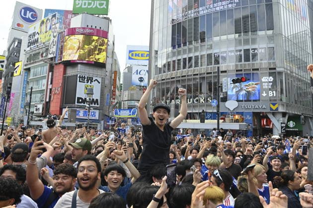 Japan-Tunisia World Cup match draws fans to Tokyo s Shibuya District TOKYO, JAPAN - JUNE 21: Football fans celebrate the victory of Japan team over Tunisia in public areas of Tokyo s Shibuya district, Japan on June 21, 2026, after the FIFA World Cup, WM, Weltmeisterschaft, Fussball 2026 Group F match between Japan and Tunisia being played in Monterrey, Mexico. The match is considered crucial for both teams hopes of advancing to the knockout stage of the tournament. David Mareuil Anadolu Tokyo Japan. Editorial use only. Please get in touch for any other usage.  Copyright: x2026xAnadoluxDavidxMareuilx