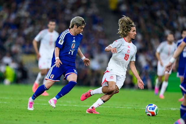 Fußball, FIFA WM 2026, Tunesien - Japan #7 June 29, 2026, Monterrey, Nuevo Leon, Mexico: Junya Ito of Japan (L) chases Hannibal Mejbri of Tunisia (R) during the FIFA World Cup, WM, Weltmeisterschaft, Fussball 2026 match between Tunisia and Japan. Tunisia hosted Japan at Monterrey Stadium on June 20, 2026 in Monterrey, Mexico Monterrey Mexico - ZUMAf196 20260629_zsp_f196_027 Copyright: xMartinxFonsecax