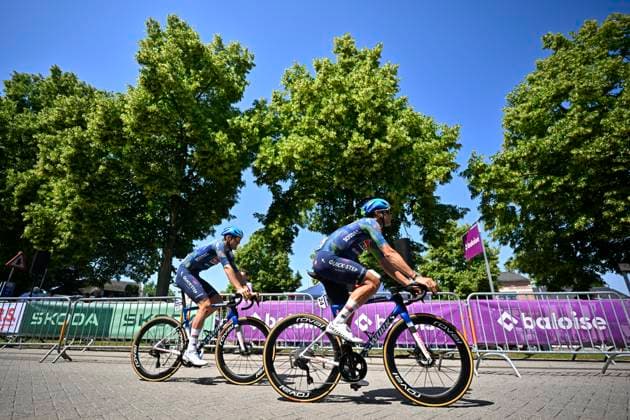Baloise Belgium Tour 2026 Stage 5 HOEILAART, BELGIUM - JUNE 21 : Bastiaens Ayco (BEL) of Soudal Quick-Step, Stuyven Jasper (BEL) of Soudal Quick-Step before the start of the race during stage 5 of the 95th edition of Baloise Tour of Belgium an UCI ProSeries 2.Pro cycling road race stage for Men Elite of 183.6 km with start in Gingelom and finish in Hoeilaart on June 21, 2026 in Hoeilaart, Belgium, 21 06 2026 ( Motordriver Stephan Boone - Hoeilaart Belgium  Copyright: xTomasxSiskx