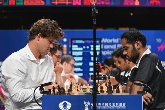 RECORD DATE NOT STATED FIDE World Team Rapid and Blitz Chess Championships 2026 - DAY 5 Magnus Carlsen, a Norwegian player battles Arjun Erigaisi, an Indian player during Semi Final of FIDE World Team Rapid and Blitz Chess Championships 2026 on June 21, 2026 in Hong Kong. (Photo by Kobe Li Nexpher Images) Hong Kong