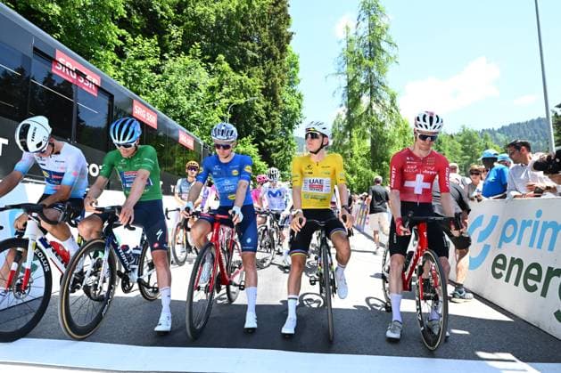 Tour de Suisse 2026 Stage 5 VILLARS-SUR-OLLON, SWITZERLAND - JUNE 21 : Pogacar Tadej (SLO) of UAE Team Emirates XRG, Gregoire Romain (FRA) of Groupama FDJ United, Vervaeke Louis (BEL) of Soudal Quick-Step, Vacek Mathias (CZE) of Lidl Trek, Schmid Mauro (SUI) of Team Jayco AlUla at the start line during stage 5 of the 89th edition of Tour de Suisse an UCI World Tour 2.UWT cycling road race stage for Men Elite of 151.1 km with start in Villars-sur-Ollon and finish in Villars-sur-Ollon on June 21, 2026 in Villars-sur-Ollon, Switzerland, 21 06 2026 ( Motordriver Guy De Vuyst - Villars-sur-Ollon Switzerland  Copyright: xVincentxKalutx