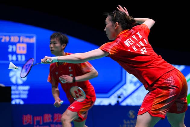 (260621) -- MACAO, June 21, 2026 -- Jiang Zhenbang Wei Yaxin (R) of China compete during the mixed doubles final against Chan Yin Chak Ng Tsz Yau of China s Hong Kong at Macao Open badminton tournament 2026 in Macao, south China, June 21, 2026. ) (SP)CHINA-MACAO-BADMINTON-MACAO OPEN 2026-MIXED DOUBLES FINAL (CN) CheongxKamxKa 