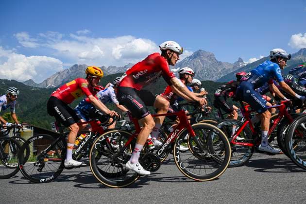 Tour de Suisse 2026 Stage 5 VILLARS-SUR-OLLON, SWITZERLAND - JUNE 21 : Tjotta Martin (NOR) of UNO-X Mobility, Slock Liam (BEL) of Lotto Intermarche in action during stage 5 of the 89th edition of Tour de Suisse an UCI World Tour 2.UWT cycling road race stage for Men Elite of 151.1 km with start in Villars-sur-Ollon and finish in Villars-sur-Ollon on June 21, 2026 in Villars-sur-Ollon, Switzerland, 21 06 2026 ( Motordriver Guy De Vuyst - Villars-sur-Ollon Switzerland  Copyright: xVincentxKalutx