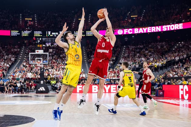 MUNICH, GERMANY - JUNE 21: Neno Dimitrijevic (FC Bayern Muenchen, 0) shooting a stepback shot against Jonas Mattisseck (Alba Berlin, 9) during the easyCredit Basketball Bundesliga Playoffs Final Game 5 match between FC Bayern Muenchen vs. Alba Berlin at SAP Garden on June 21, 2026 in Munich, Germany. Bavaria Germany Copyright: xSteffiexWunderlx