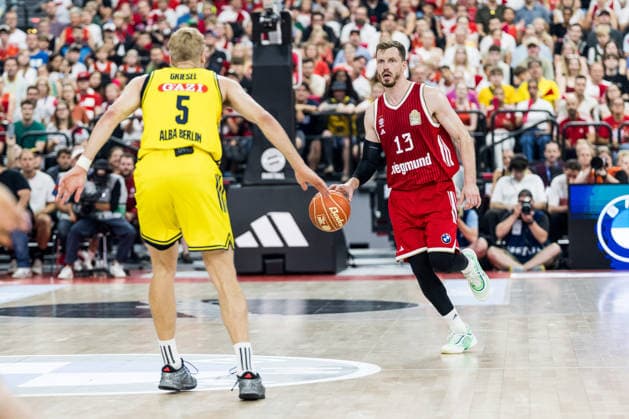 MUNICH, GERMANY - JUNE 21: Andreas Andi Obst (FC Bayern Muenchen, 13) controls the ball against Sam Griesel (Alba Berlin, 5) during the easyCredit Basketball Bundesliga Playoffs Final Game 5 match between FC Bayern Muenchen vs. Alba Berlin at SAP Garden on June 21, 2026 in Munich, Germany. Bavaria Germany Copyright: xSteffiexWunderlx