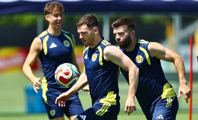 Andy Robertson of Scotland and Grant Hanley of Scotland Scotland Training and press conference, PK, Pressekonferenz 2026 FIFA World Cup, WM, Weltmeisterschaft, Fussball Football, Atrium Health Performance Park, Charlotte, USA - 21 Jun 2026Charlotte Atrium Health Performance Park United States of America EDITORIAL USE ONLY No use with unauthorised audio, video, data, fixture lists, club league logos or live services. Online in-match use limited to 120 images, no video emulation. No use in betting, games or single club league player publications.  Copyright: xMichaelxZemanek Shutterstockx 16928934aw