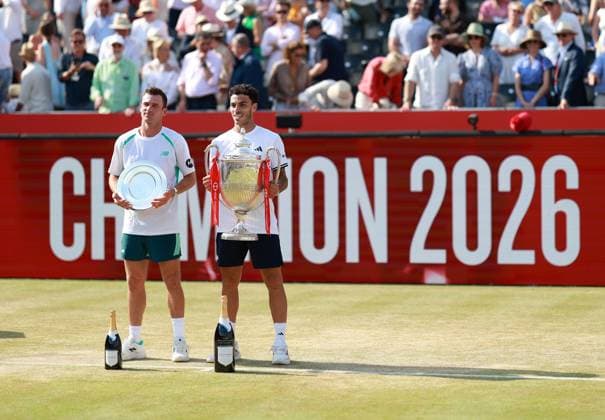 Francisco Cerundolo of Argentina celebrates with the trophy next to Tommy Paul HSBC Queen s Club Championships, Day Sixteen, Tennis, Queen s Club, West Kensington, London, UK - 21 Jun 2026London Queen s Club United Kingdom  Copyright: xEllaxLing Shutterstockx 16929308bw