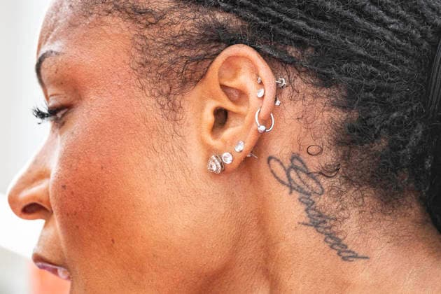 RECORD DATE NOT STATED 21st June 2026; Alexander Stadium, Birmingham, West Midlands, England; 2026 Novuna UK Athletics Championships; detail of Amber Annings neck tattoo as she celebrates winning the women s 400m GodfreyxPitt