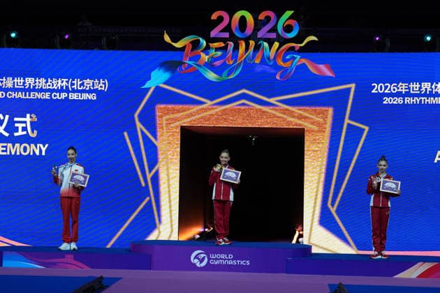 (260621) -- BEIJING, June 21, 2026 -- Gold medalist Sofiia Ilteriakova (C) of Russia, silver medalist Wang Qi (L) of China and bronze medalist Arina Kovshova of Russia pose during the awarding ceremony for the Individual Ball event at the 2026 Rhythmic gymnastics, Rhythmische Sportgymnastik, RSG World Challenge Cup Beijing in Beijing, China, June 21, 2026. ) (SP)CHINA-BEIJING-RHYTHMIC GYMNASTICS-WORLD CHALLENGE CUP(CN) XiexHan 
