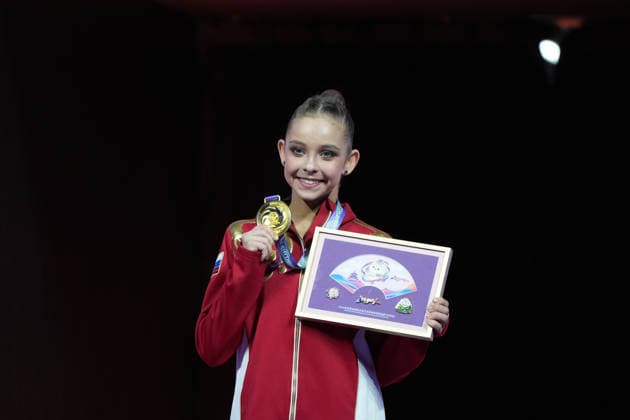 (260621) -- BEIJING, June 21, 2026 -- Sofiia Ilteriakova of Russia poses for photos during the awarding ceremony for the Individual Clubs event at the 2026 Rhythmic gymnastics, Rhythmische Sportgymnastik, RSG World Challenge Cup Beijing in Beijing, China, June 21, 2026. ) (SP)CHINA-BEIJING-RHYTHMIC GYMNASTICS-WORLD CHALLENGE CUP(CN) XiexHan 