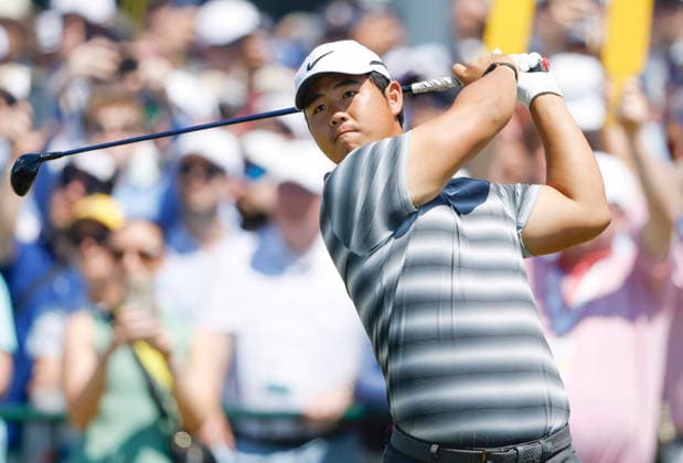 Tom Kim of South Korea tees off on the 1st hole during the final round of the 126th U.S. Open Golf Championship at Shinnecock Hills Golf Club in Southampton, NY, on Sunday, June 21, 2026.  NYC20260621801 JOHNxANGELILLO