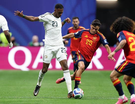 (260622) -- ATLANTA, June 22, 2026 -- Mohamed Kanno (L) of Saudi Arabia competes with Pedri of Spain during the group H match between Spain and Saudi Arabia at the 2026 FIFA World Cup, WM, Weltmeisterschaft, Fussball at Atlanta Stadium in Atlanta, the United States, June 21, 2026. ) (SP)U.S.-ATLANTA-FOOTBALL-FIFA WORLD CUP-GROUP H-ESP VS KSA WangxKaiyan 