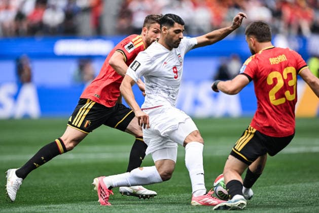 Mehdi Taremi of IR Iran (C) and Nicolas Raskin of Belgium (R) fight for possession under pressure from Brandon Mechele of Belgium (L) during a FIFA Men’s World Cup 2026 Group Stage football match between Belgium and Iran at Los Angeles Stadium, in Inglewood on June 21th 2026 (Photo by Nayra Halm SPP)  Copyright: xNayraxHalm SPPx Sportspressphoto_SPR172777