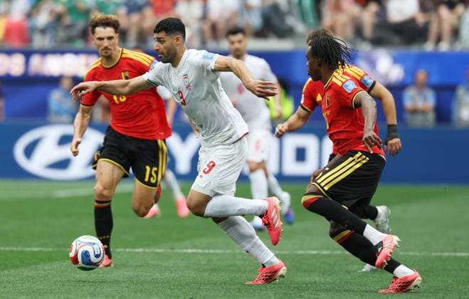 FIFA World Cup, WM, Weltmeisterschaft, Fussball 2026 - Group G - Belgium vs Iran epaselect Mehdi Taremi of Iran (C) in action during the FIFA World Cup 2026 group stage match Belgium against Iran, in Los Angeles, USA, 21 June 2026. LOS ANGELES United States  Copyright: xCHRISTOPHERxTORRESx