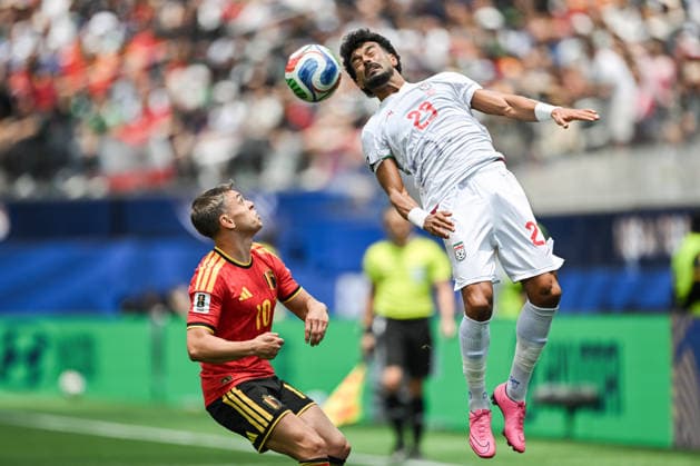 Ramin Rezaeian of IR Iran (R) heads the ball under pressure from Leandro Trossard of Belgium (L) during a FIFA Men’s World Cup 2026 Group Stage football match between Belgium and Iran at Los Angeles Stadium, in Inglewood on June 21th 2026 (Photo by Nayra Halm SPP)  Copyright: xNayraxHalm SPPx Sportspressphoto_SPR172889