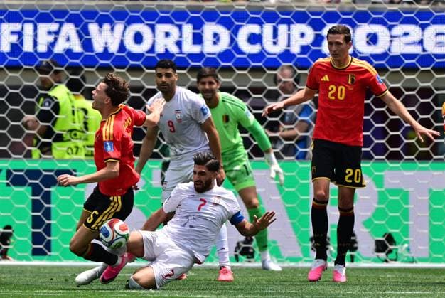 Iran s Alireza Jahanbakhsh commits a fault on Belgium s Maxim De Cuyper during a soccer game between Belgian national team, Nationalteam Red Devils and Iran, on Sunday 21 June 2026, at the SoFi stadium in Los Angeles, the second game in the group stage of the FIFA World Cup, WM, Weltmeisterschaft, Fussball 2026 in the United States of America. The Diables Rouges - Rode Duivels were drawn into Group G. DIRKxWAEM  x178660299x