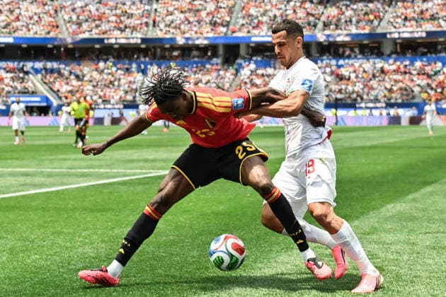 Nathan Ngoy of Belgium (L) and Ali Nemati of IR Iran (R) fight for possession during a FIFA Men’s World Cup 2026 Group Stage football match between Belgium and Iran at Los Angeles Stadium, in Inglewood on June 21th 2026 (Photo by Nayra Halm SPP)  Copyright: xNayraxHalm SPPx Sportspressphoto_SPR172915