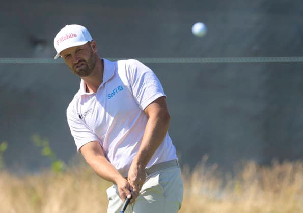 Wyndham Clark chips to the 6th green during the final round of the 126th U.S. Open Golf Championship at Shinnecock Hills Golf Club in Southampton, NY, on Sunday, June 21, 2026.  NYC20260621837 JOHNxANGELILLO