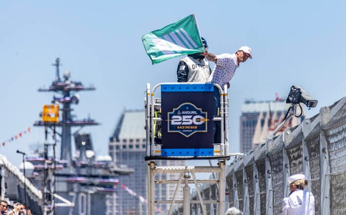 SAN DIEGO, CA - JUNE 21: Secretary of Defense Pete Hegseth waves the green flag to start the Anduril 250 NASCAR, Motorsport, USA Cup Series Race, Sunday, June 21, 2026, at Naval Base Coronado in San Diego, California. (Photo by Tony Ding Icon Sportswire) AUTO: JUN 21 NASCAR Cup Series Anduril 250 Race the Base EDITORIAL USE ONLY Icon46520260621002250