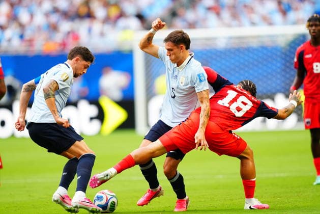 Uruguay v Cape Verde - FIFA World Cup, WM, Weltmeisterschaft, Fussball 2026 - Group H FLORIDA, USA - JUNE 21: Manuel Ugarte (5) of Uruguay in action against Telmo Arcanjo (18) of Cape Verde during the 2026 FIFA World Cup First Stage Group H match between Uruguay and Cape Verde at the Hard Rock Stadium (Miami Stadium) in Miami Gardens, Florida, United States on June 21, 2026. Evrim Aydin Anadolu Florida United States. Editorial use only. Please get in touch for any other usage.  Copyright: x2026xAnadoluxEvrimxAydinx